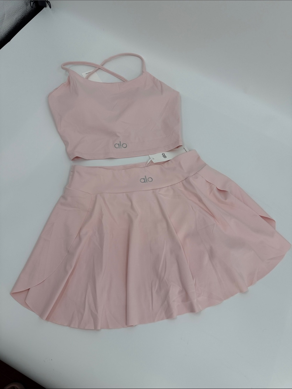 ALO Yoga Pink Crisscross Crop Top and Flared Skirt Set